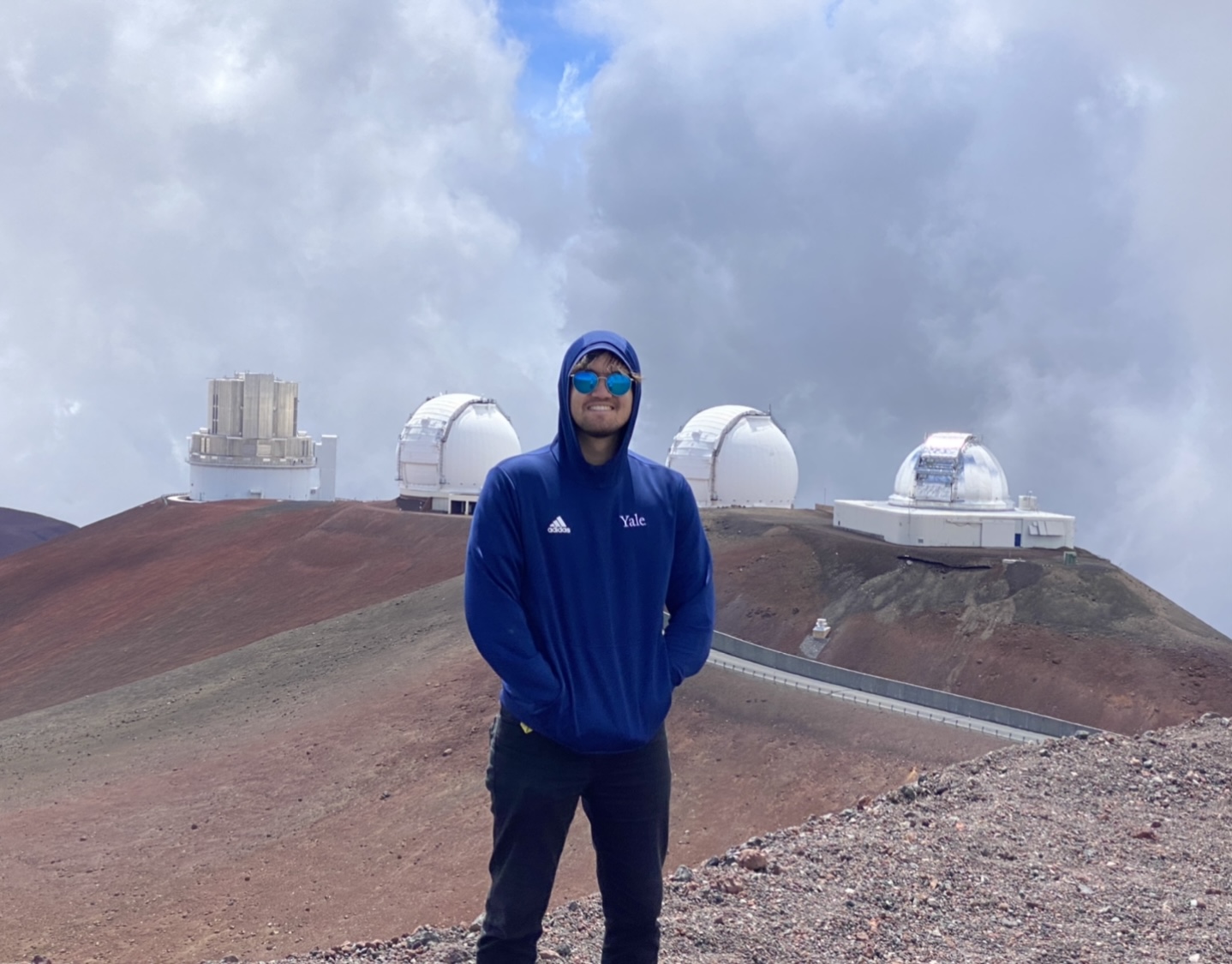 Picture of me on Mauna Kea with the Keck Telescopes.